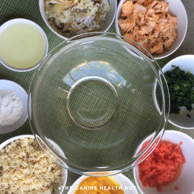 If you’ve ever owned both a dog and fish, you might’ve wondered: “Can dogs eat fish food?” Or maybe you're just exploring healthier options and stumbled upon fish dog food in a pet store. While it might sound unusual at first, fish-based diets for dogs are becoming increasingly popular—and for good reason.

This blog post dives deep into the concept of fish dog food, separating fact from fiction and helping you decide whether it’s a smart move for your pet’s diet.

Why Fish in Dog Food?
Most traditional dog foods rely on meats like chicken, beef, or lamb. However, fish dog food offers a lean and nutrient-rich alternative. Here’s why many dog owners are making the switch:

1. High in Omega-3 Fatty Acids
Fish like salmon, herring, and sardines are rich in Omega-3s, which:

Promote healthy skin and shiny coats

Reduce inflammation

Improve joint health in senior dogs

Support brain and eye development in puppies

2. Excellent Source of Protein
Fish contains high-quality protein that helps build muscle and supports overall growth and repair in dogs.

3. Hypoallergenic Benefits
Some dogs are allergic to common proteins like chicken or beef. Fish dog food is often used in hypoallergenic formulas, making it ideal for dogs with sensitive stomachs or skin issues.

Is Fish Dog Food Safe?
Yes, fish dog food is generally safe—as long as it's formulated for canine consumption. However, there are two very different interpretations of the term "fish dog food":

✅ 1. Commercial Fish-Based Dog Food
This is food specifically made for dogs, with fish as the main protein. These are safe, nutritionally balanced, and vet-approved.

❌ 2. Fish Food for Aquariums (Not for Dogs!)
This refers to the food we feed aquarium fish—flakes, pellets, or frozen worms. This is not meant for dogs and can be harmful if ingested in large quantities.

If you're asking whether your dog can eat fish flakes by accident—yes, a small amount may not hurt. But it’s not designed for their system, and repeated exposure can cause issues.

Key Ingredients to Look For in Fish Dog Food
When choosing the best fish dog food, examine the ingredients list carefully. Here’s what to look for:

✅ High-Quality Fish Sources
Salmon

Whitefish

Ocean fish

Trout

Sardines

Avoid vague terms like “fish meal” unless the source is clearly identified (e.g., “salmon meal”).

✅ Omega-3 Enrichment
Look for added fish oil or natural omega-rich fish to boost health benefits.

✅ Whole Grains or Grain-Free (Depending on Your Dog’s Needs)
Some dogs thrive on grains like brown rice or oats, while others do better on grain-free formulas with sweet potatoes or peas.

✅ No Fillers or Artificial Preservatives
Avoid products with corn, soy, wheat, or chemical preservatives like BHA/BHT.

Best Fish Dog Food Brands (As of 2025)
Here are some trusted brands known for high-quality fish-based dog food:

Brand	Fish Used	Grain-Free	Suitable For
Orijen Six Fish	6 types of fish	Yes	All life stages
Blue Buffalo Life Protection	Whitefish	No	Adult dogs
Taste of the Wild Pacific Stream	Salmon	Yes	Dogs with sensitivities
Wellness CORE Ocean	Whitefish, Herring	Yes	Active dogs
Natural Balance LID Fish & Sweet Potato	Salmon	Yes	Dogs with allergies

Homemade Fish Dog Food: Is It Worth It?
Some dog owners prefer preparing fish meals at home. While this can work, it must be done carefully to ensure a balanced diet.

Pros:
You control the ingredients

No preservatives or artificial fillers

Can tailor meals for allergies

Cons:
Nutritional imbalance risk

Takes time and effort

Requires vet consultation

Example Recipe: Simple Salmon & Veggie Bowl
Ingredients:

1 cup cooked salmon (boneless, skinless)

½ cup boiled sweet potatoes

½ cup chopped spinach

1 tsp olive oil (for Omega-3 boost)

Mix all ingredients and let cool before serving. Ensure you’re not adding any spices, garlic, or onions—these are toxic to dogs.

What If Your Dog Eats Aquarium Fish Food?
If your dog accidentally munches on fish food made for aquarium pets, here’s what you should do:

1. Stay Calm
Small amounts are unlikely to cause major harm.

2. Check Ingredients
Look for toxic ingredients like ethoxyquin, copper sulfate, or preservatives that may upset your dog’s stomach.

3. Monitor for Symptoms
Watch for vomiting, diarrhea, or unusual behavior. If anything seems off, contact your vet immediately.

When Fish Dog Food Is Not the Right Choice
Fish-based diets are not suitable for all dogs. You should reconsider or consult a vet if your dog:

Has a diagnosed seafood allergy

Is prone to urinary issues (some fish may increase purine levels)

Is on a prescription diet for kidney or liver conditions

Always introduce new food gradually over 7–10 days to avoid gastrointestinal issues.

Real-Life Story: How Fish Dog Food Helped Max’s Skin Allergies
Max, a 6-year-old Golden Retriever, constantly battled itchy skin and hot spots. His owner, Sarah, tried different treatments—from shampoos to steroids—but nothing worked long-term. After a vet recommended switching to a fish dog food diet, Max’s condition improved within weeks.

His coat grew shinier, scratching reduced dramatically, and his energy levels returned to normal.

Sarah’s advice?

“Don’t underestimate what a protein change can do. Fish dog food gave Max his life back.”

Fish Dog Food vs. Traditional Meat-Based Dog Food
Feature	Fish Dog Food	Traditional Dog Food
Protein Source	Fish (e.g., salmon, whitefish)	Chicken, beef, lamb
Omega-3 Content	High	Moderate to low
Allergen Risk	Lower	Higher (especially chicken/beef)
Taste Preference	Some dogs love it, others don’t	Generally accepted
Digestibility	High (especially in limited-ingredient diets)	Varies by brand and meat used

Conclusion: Should You Switch to Fish Dog Food?
Fish dog food is an excellent option for many dogs—especially those with allergies, skin conditions, or digestive sensitivities. Rich in protein and Omega-3s, it offers real health benefits when sourced and used properly.

However, it’s essential to ensure that you’re feeding your pup fish food meant for dogs, not food made for aquarium pets.

Before making a switch, always consult your veterinarian, particularly if your dog has medical conditions. And remember, just like humans, every dog is different—what works for one may not work for another.